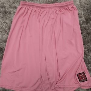 Five Ultimate pink basketball shorts. Size large